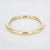 Gouden stainless steel bangle met geborstelde afwerking, large dikte.