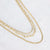 Gelaagde gouden stainless steel ketting met drie verschillende schakels.