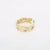Gouden stainless steel ring met verstelbare pasvorm en golvend dubbelband design.