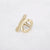Gouden stainless steel ring met organische open vorm en geborstelde matte afwerking.