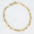 Gouden stainless steel schakelketting met fijne en gladde schakels en verstelbare sluiting.